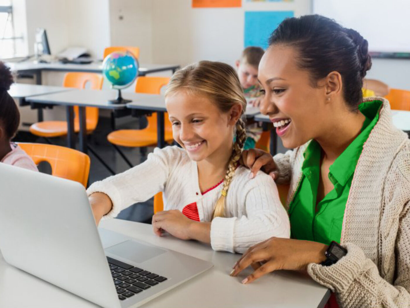 Teacher happily using AI teacher assistant to help student with an essay